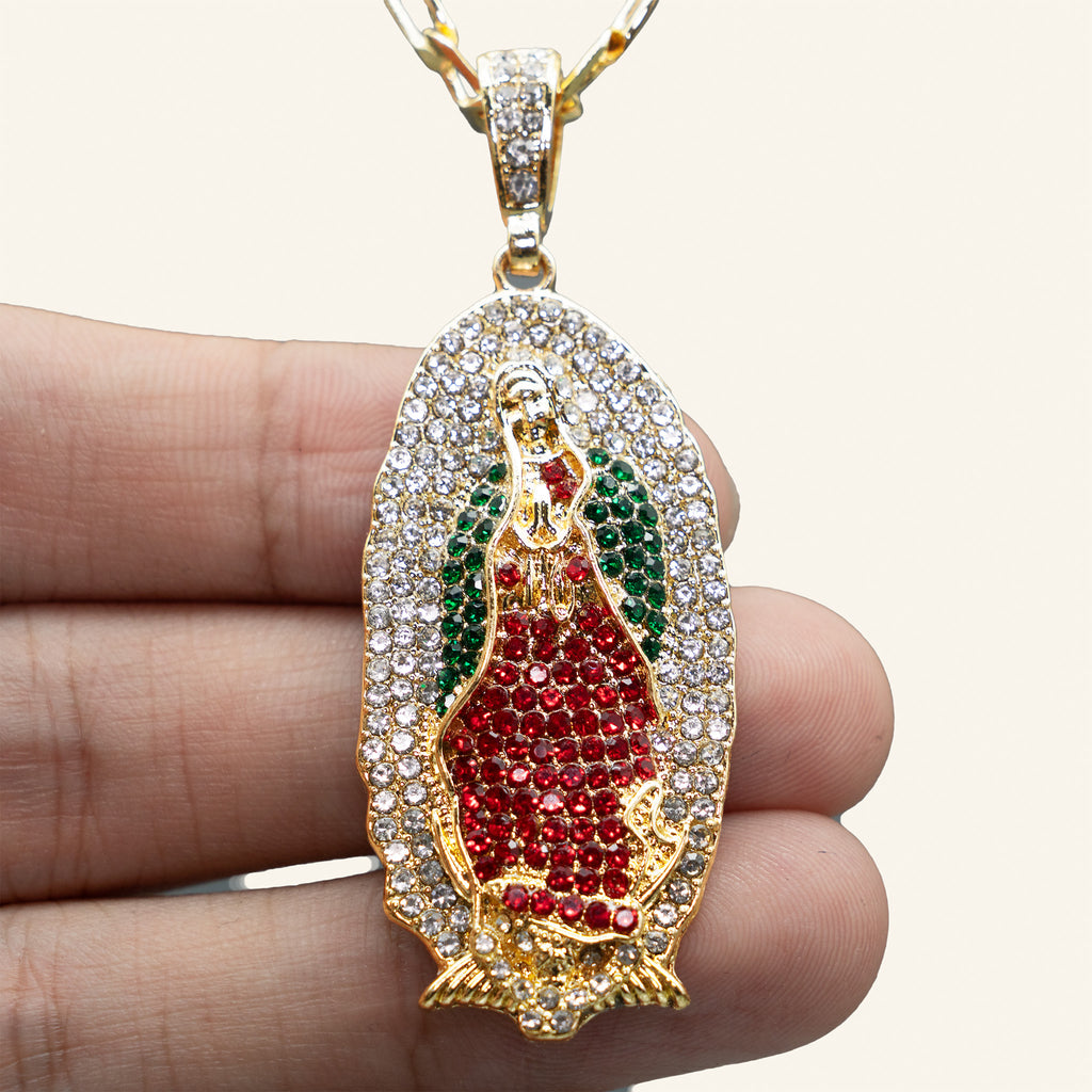 Virgen de Guadalupe pendant in hand for size reference