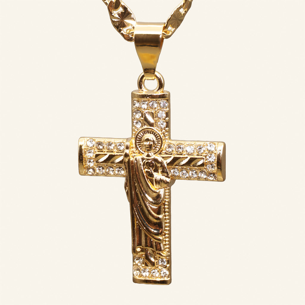 Close-up of San Judas Tadeo cross framed with clear stones
