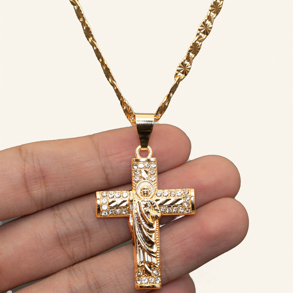San Judas Tadeo iced cross held in hand to show size
