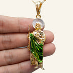 San Judas Tadeo figure pendant in hand for size reference
