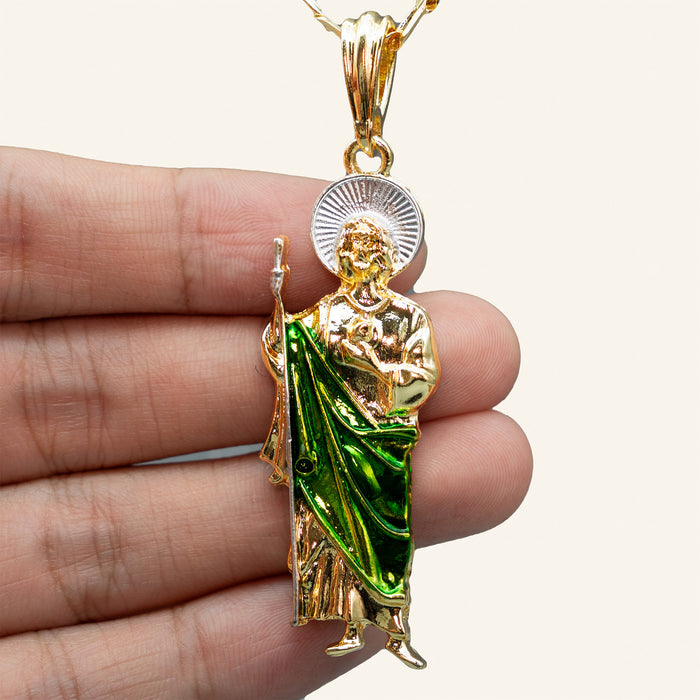 San Judas Tadeo figure pendant in hand for size reference